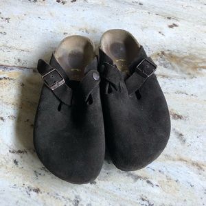 Birkenstock’s: brown leather slip ons